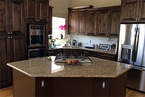 Giallo Ornamental Granite Kitchen and Cabinets