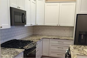 Golden Vegas Granite Countertops & Solid Shaker White Cabinets