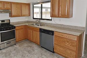 Andover Honey Oak Cabinets & Desert Gold Granite